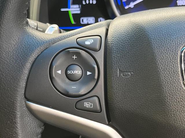 フィットハイブリッド Sパッケージ 禁煙車 メーカーナビフルセグ バックカメラ LEDヘッド 純正16インチAW 衝突被害軽減 ETC Bluetooth クルーズコントロール 革巻ステアリング パドルシフト スマートキー DVD再生(26枚目)