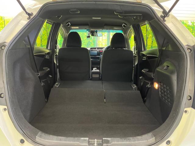 フィットハイブリッド Sパッケージ 禁煙車 メーカーナビフルセグ バックカメラ LEDヘッド 純正16インチAW 衝突被害軽減 ETC Bluetooth クルーズコントロール 革巻ステアリング パドルシフト スマートキー DVD再生(34枚目)