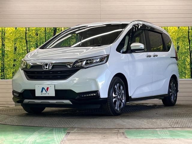 フリードハイブリッド ハイブリッド・クロスター　禁煙車　純正ナビフルセグ　両側電動ドア　バックカメラ　ホンダセンシング　アダプティブクルーズ　ＬＥＤヘッド　純正１５インチＡＷ　半革シート　ルーフレール　シートヒーター　ＥＴＣ　Ｂｌｕｅｔｏｏｔｈ（50枚目）