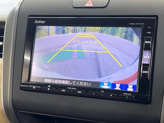 フリードハイブリッド ハイブリッド・Ｇホンダセンシング　Ｃパッケージ　７人乗　禁煙車　純正ナビフルセグ　フリップダウンモニター　両側電動ドア　バックカメラ　ＬＥＤヘッド　ＥＴＣ　Ｂｌｕｅｔｏｏｔｈ　後席サンシェード　スマートキー　オートエアコン　ＤＶＤ再生（5枚目）