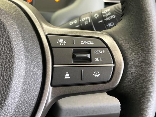 フリード e:HEVクロスター 登録済未使用車 6人乗 ホンダセンシング 両側電動ドア ナビ装着スペシャルPKG フルLEDヘッド 純正15インチAW 半革シート シートヒーター スマートキー オートエアコン リアクーラー(4枚目)