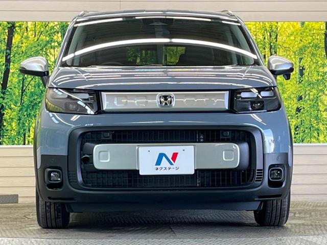 フリード e:HEVクロスター 登録済未使用車 6人乗 ホンダセンシング 両側電動ドア ナビ装着スペシャルPKG フルLEDヘッド 純正15インチAW 半革シート シートヒーター スマートキー オートエアコン リアクーラー(14枚目)