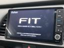 フィット e:HEVホーム 20周年特別仕様車 カーサ 禁煙車 純正9型ナビTV バックカメラ ホンダセンシング 渋滞追従アダプティブクルーズ LEDヘッド 純正16インチAW 半革シート シートヒーター ETC Bluetooth DVD再生 中古車画像_3
