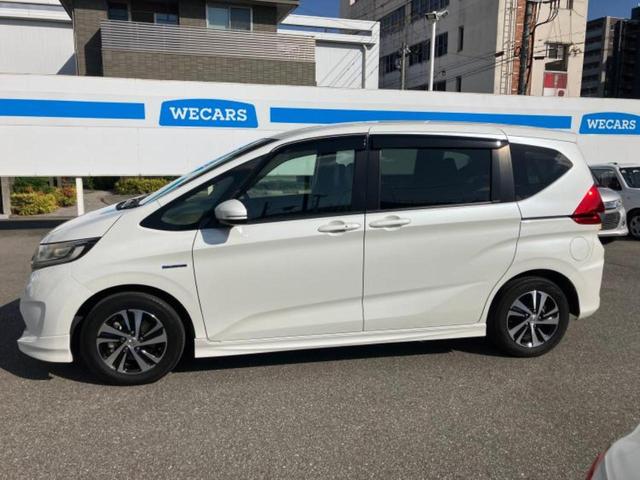 フリードハイブリッド ハイブリッドEX 新品タイヤ/純正エアロ/保証書/純正 SDナビ/ホンダセンシング/両側電動スライドドア/シートヒーター 前席/車線逸脱防止支援システム/シート ハーフレザー/ヘッドランプ LED 衝突被害軽減システム(2枚目)