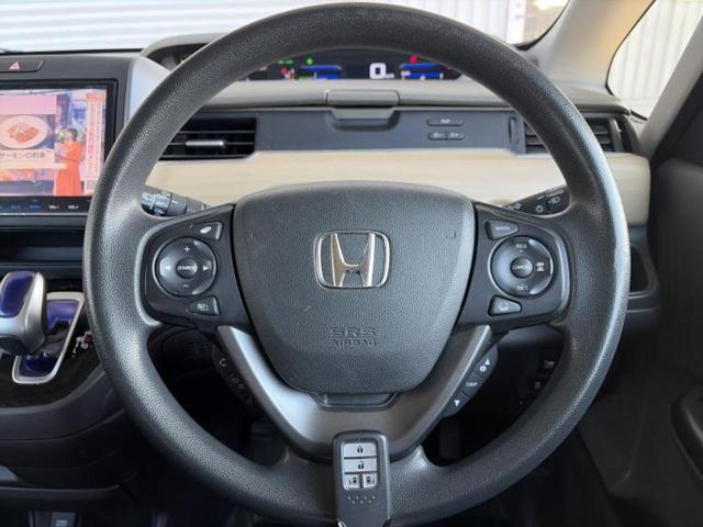 フリードハイブリッド ハイブリッドＧホンダセンシング　新品タイヤ／保証書／純正　９インチ　ＳＤナビ／ホンダセンシング／両側電動スライドドア／車線逸脱防止支援システム／ヘッドランプ　ＬＥＤ／Ｂｌｕｅｔｏｏｔｈ接続／ＥＴＣ／ＥＢＤ付ＡＢＳ／バックモニター（14枚目）