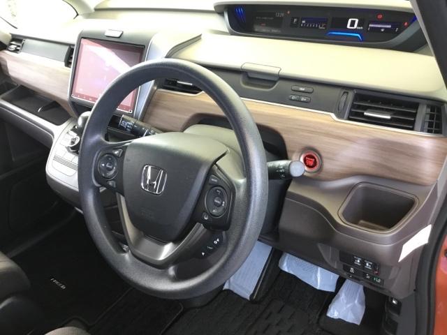 フリード Ｇ・ホンダセンシング　ハンズフリースライドドア　後席モニター　ＥＴＣ　前後ドラレコ　純正ナビ　Ｆセグ　追突被害軽減ブレーキ　ｉストップ　Ｗエアバッグ　パワーウィンドウ　アクティブクルーズコントロール　スマートキ　ＶＳＡ（29枚目）