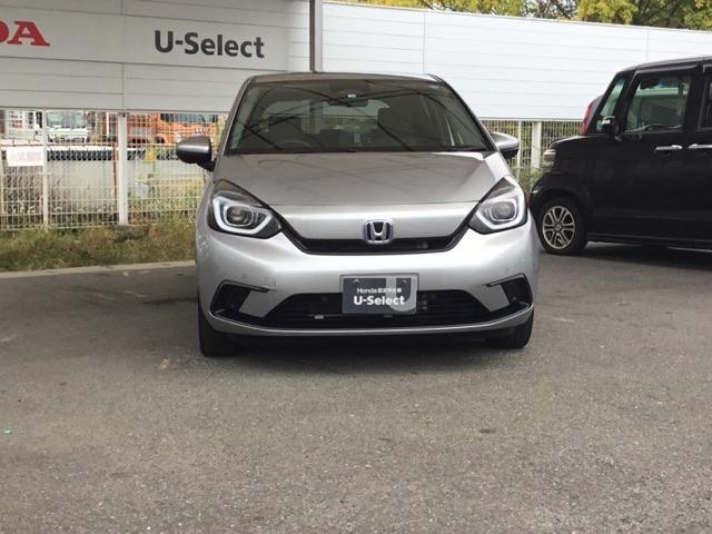 フィット ｅ：ＨＥＶベーシック　純正ＣＤチューナー　社外メモリーナビ　バックカメラ　ＥＴＣ　カーテンエアバッグ　ＣＭＢＳ　地デジ　Ｒカメ　セキュリティアラーム　アイドリングストップ　ナビＴＶ　スマートキー　ＬＥＤヘッド　エアバッグ（6枚目）