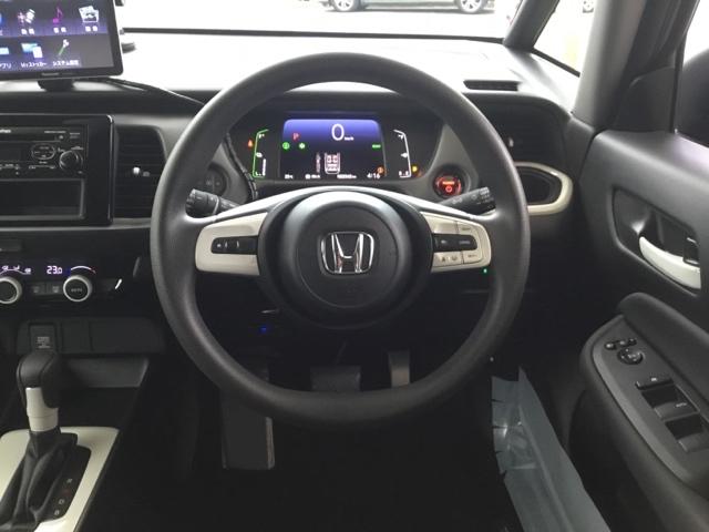 フィット ｅ：ＨＥＶベーシック　純正ＣＤチューナー　社外メモリーナビ　バックカメラ　ＥＴＣ　カーテンエアバッグ　ＣＭＢＳ　地デジ　Ｒカメ　セキュリティアラーム　アイドリングストップ　ナビＴＶ　スマートキー　ＬＥＤヘッド　エアバッグ（16枚目）