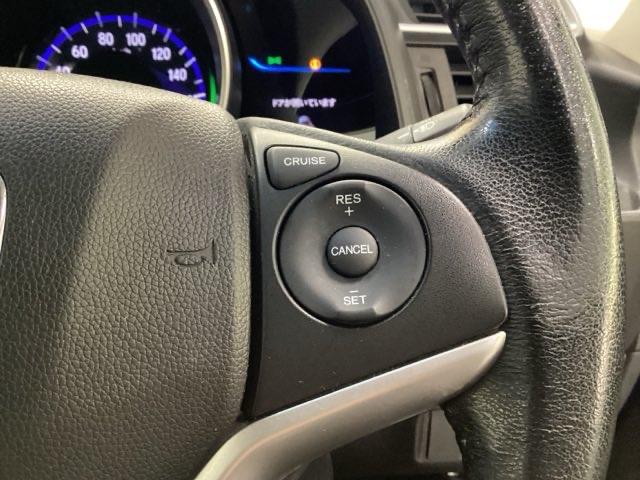 フィットハイブリッド Ｌパッケージ　あんしんパッケージ　クルコン　バックカメラ　純正ナビ　フルセグ　ナビ＆ＴＶ　サイドエアバック　ＤＶＤ再生　ＬＥＤ　ＥＣＯＮ　オートクルーズコントロール　イモビライザー　ＥＳＣ　ＡＵＴＯエアコン　ＡＢＳ（16枚目）