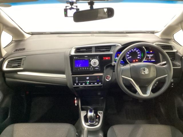 フィットハイブリッド Ｆパッケージ　ＣＤ・ＵＳＢコンポ　ＥＴＣ　ＡＵＴＯエアコン　Ｄレコ　助手席エアバック　ＥＣＯＮ　ＡＢＳ付　横滑り防止システム　キーレスエントリー　運転席エアバック　ＬＥＤライト　パワーステアリング　パワーウィンドウ（2枚目）