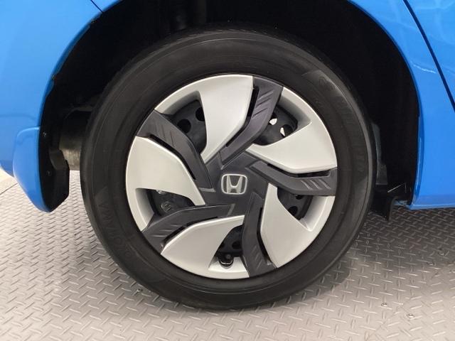 フィットハイブリッド Ｆパッケージ　ＣＤ・ＵＳＢコンポ　ＥＴＣ　ＡＵＴＯエアコン　Ｄレコ　助手席エアバック　ＥＣＯＮ　ＡＢＳ付　横滑り防止システム　キーレスエントリー　運転席エアバック　ＬＥＤライト　パワーステアリング　パワーウィンドウ（19枚目）