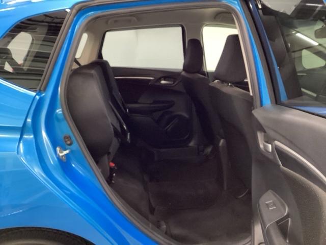 フィットハイブリッド Ｆパッケージ　ＣＤ・ＵＳＢコンポ　ＥＴＣ　ＡＵＴＯエアコン　Ｄレコ　助手席エアバック　ＥＣＯＮ　ＡＢＳ付　横滑り防止システム　キーレスエントリー　運転席エアバック　ＬＥＤライト　パワーステアリング　パワーウィンドウ（25枚目）