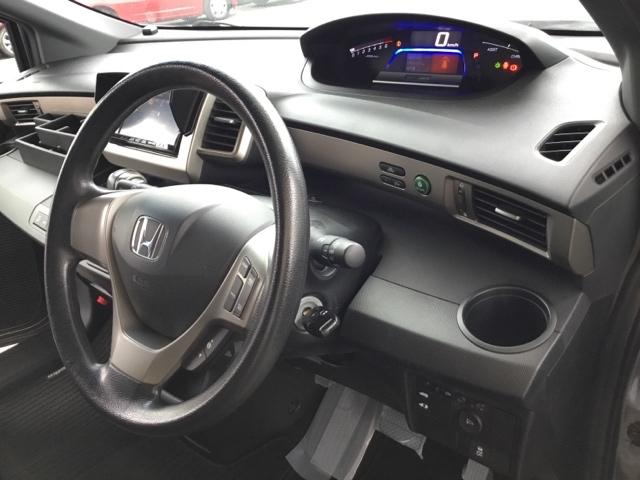 フリードスパイクハイブリッド ジャストセレクション 片側電動スライドドア クルコン 社外ナビ キーフリー セキュリティーアラーム 横滑り防止機能 DVD視聴 地デジ ナビTV エアコン 両側スライド片側電動 ETC パワーステアリング I-STOP(23枚目)