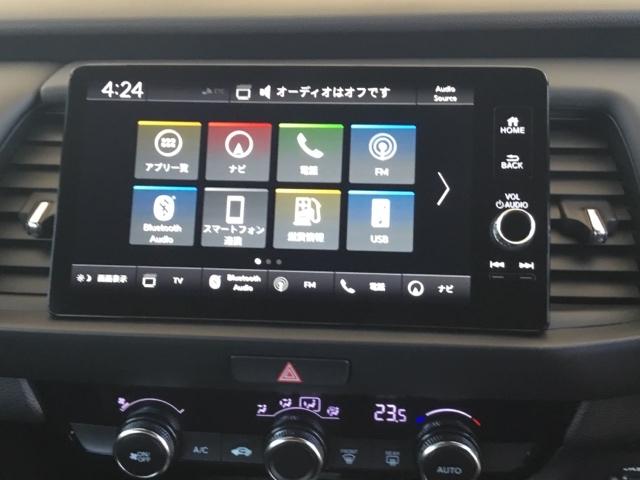 フィット ｅ：ＨＥＶホーム　全周囲カメラ　ＥＴＣ２．０　純正ナビ　フルセグ　前後誤発進抑制機能　クリソナ　マルチビュー　助手席エアバッグ　運転席エアバッグ　アイドリングストップ　禁煙　ＬＥＤライト　ＵＳＢ接続　バックカメラ（19枚目）