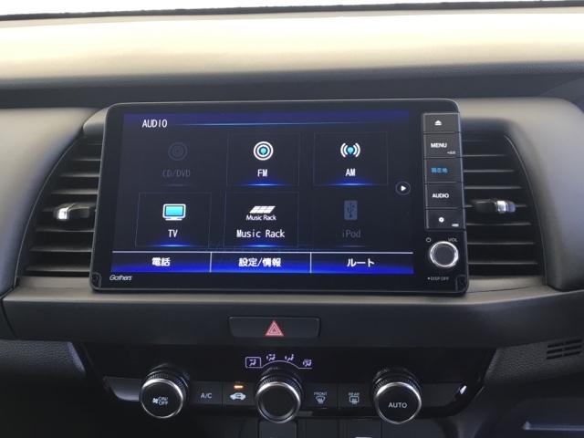 フィット ｅ：ＨＥＶホーム　クルコン　リアカメラ　純正ナビ　フルセグ　前後誤発進抑制機能　クリソナ　助手席エアバッグ　運転席エアバッグ　アイドリングストップ　ＬＥＤライト　ＵＳＢ接続　バックカメラ　ＡＢＳ　サイドエアバッグ（19枚目）