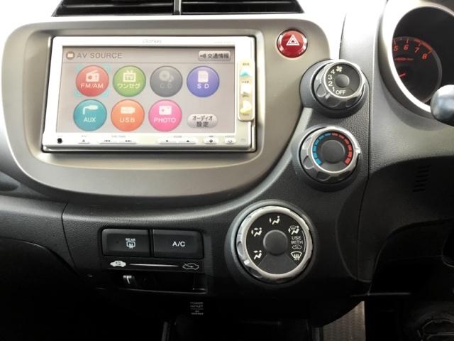 フィット Ｇ　純正ナビ　ワンセグ　ＥＴＣ　運転席助手席エアバッグ　ナビ・ＴＶ　１セグＴＶ　キーレスリモコン　盗難防止システム　エアコン　ＡＢＳ　パワーウィンドウ　パワステ　運転席エアバッグ　ＶＳＡ（18枚目）