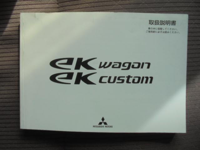 eKワゴン E 社外メモリーナビワンセグTV+バックモニター 純正キーレス ETC 運転席シートヒーター 横滑り防止機能 フロアマット・サイドバイザー 取説 ジャッキ工具・パンク修理キット搭載 室内ルームクリーニング(44枚目)
