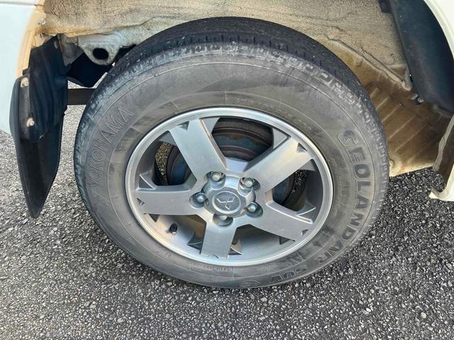 パジェロミニ  ナビ TV キーレスエントリー 電動格納ミラー AT CD DVD再生 アルミホイール 衝突安全ボディ エアコン パワーステアリング パワーウィンドウ 運転席エアバッグ 助手席エアバッグ(23枚目)