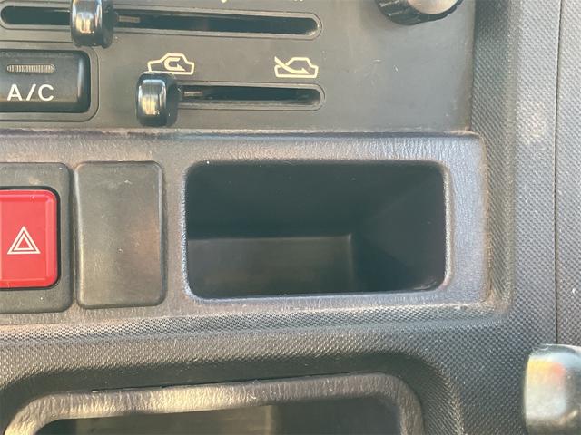 サンバートラック 軽トラ 4WD MT エアコン 運転席エアバッグ 三方開 ヘッドライトレベライザー(34枚目)