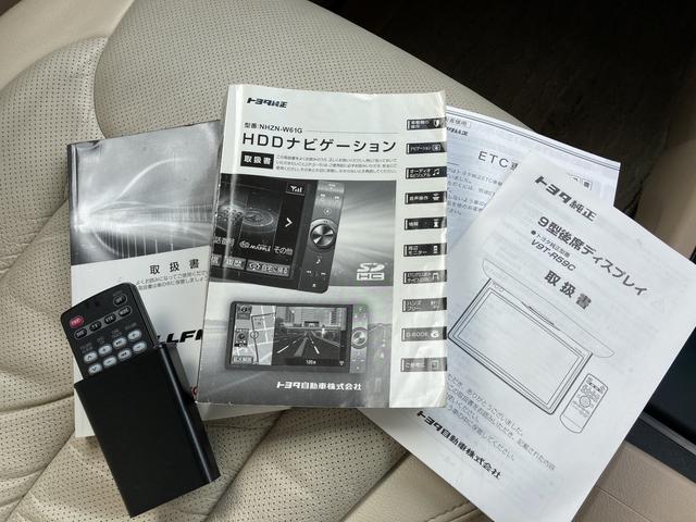 2.4V ドライブレコーダー ETC バックカメラ 純正ナビ フルセグTV クルーズコントロール 両側電動スライドドア オットマン HID 後席モニター 3列シート 運転/助手席パワーシート シートカバー(44枚目)