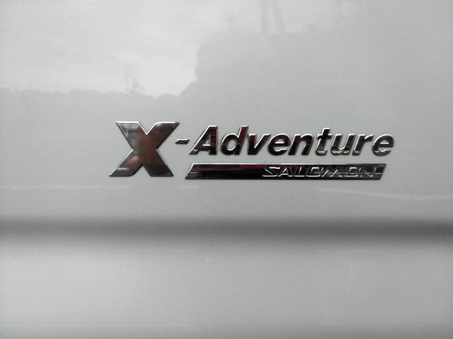 ジムニー クロスアドベンチャー　ＸＣ　インタークーラーターボ・パートタイム４ＷＤ・ルーフキャリア・社外ナビＴＶ（フルセグ）ＣＤ・ＤＶＤ・Ｂｌｕｅｔｏｏｔｈ・ドラレコ前後・ＥＴＣ・シートヒーター・純正１６インチアルミ（25枚目）