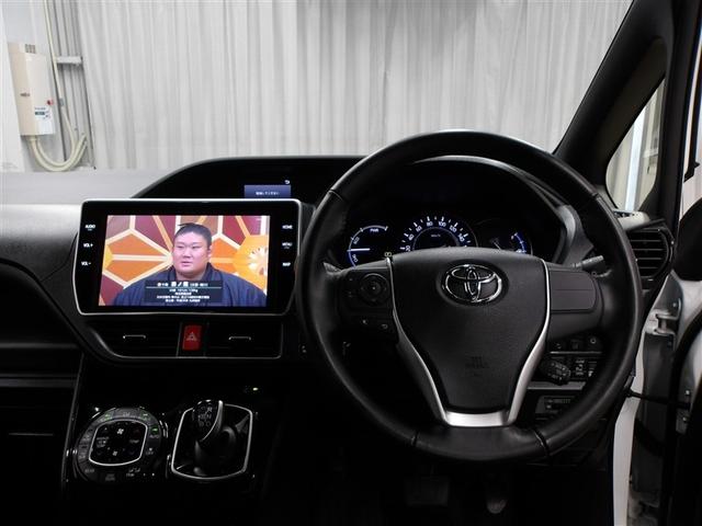 ノア ハイブリッドＳｉ　ダブルバイビー　ＬＥＤヘッドライト　クルコン　横滑り防止装置　盗難防止システム　エアバッグ　アルミ　メモリ－ナビ　スマキー　１オーナー　Ｗエアコン　ＡＢＳ　ナビ＆ＴＶ　デュアルエアバッグ　ＥＴＣ　ＤＶＤ　三列シート（4枚目）