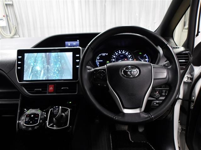 ノア ハイブリッドＳｉ　ダブルバイビーＩＩ　Ｂカメラ　横滑り防止装置　ＬＥＤ　地デジ　１オーナー　オートクルーズ　ＤＶＤ再生可　メモリナビ　エアバッグ　ＥＴＣ　ナビ＆ＴＶ　３列シート　ＡＢＳ　アルミホイール　スマートキ　盗難防止システム（4枚目）