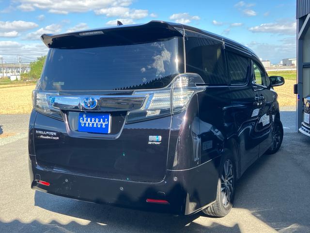 ヴェルファイアハイブリッド V Lエディション 7人乗り ナビTV Bluetooth フリップダウンモニター JBLサウンド レザーパワーシート シートヒーター オットマン クルーズコントロール 両側パワースライドドア(65枚目)