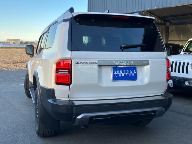 ランドクルーザー２５０ ＶＸ　モデリスタパッケージ　プロテクションフィルム　シグネチャーイルミ　レザーパワーシート　サンルーフ　クルーズコントロール　ＪＢＬ　アラウンドビューモニタ　Ｂｌｕｅｔｏｏｔｈ　ＥＴＣ２．０　パワートランク（16枚目）