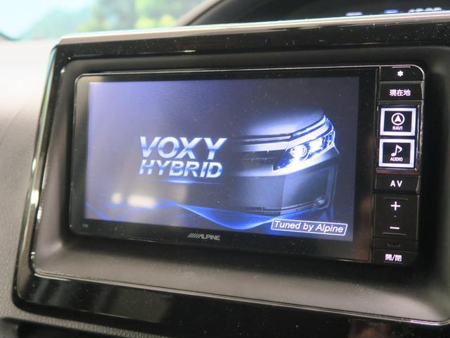 ハイブリッドV アルパインSDナビ バックカメラ 禁煙車 フリップダウンモニター 置くだけ充電 ETC 両側パワースライドドア シートヒーター LEDヘッドライト クルーズコントロール ステアリングスイッチ(7枚目)
