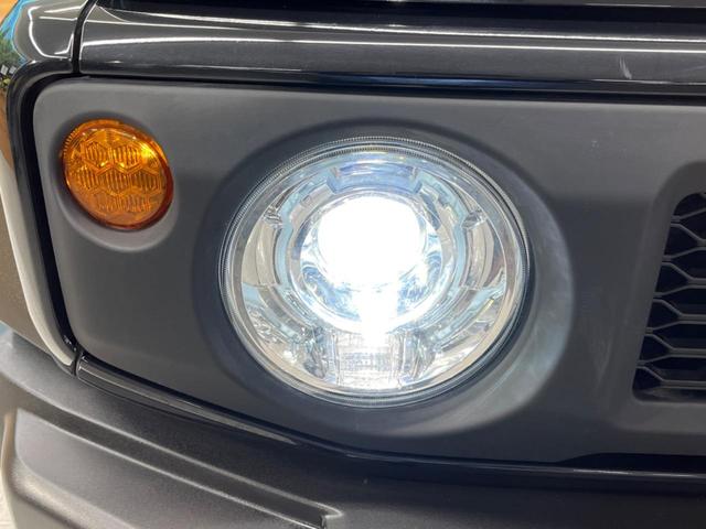 JC 4WD 純正8インチSDナビ クルーズコントロール LEDヘッドランプ 純正15インチAW シートヒーター オートエアコン 革巻きステアリング スマートキー 電動格納ミラー 禁煙車(28枚目)
