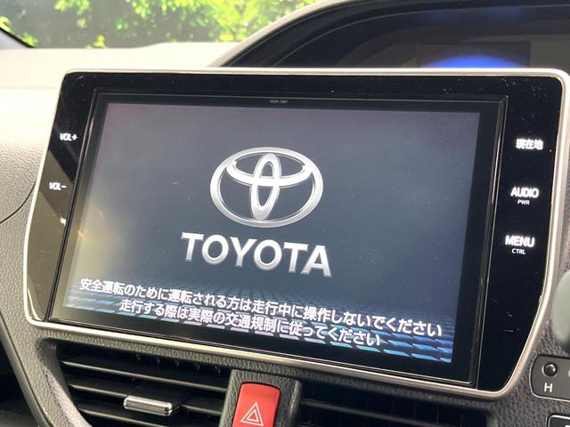 エスクァイア ハイブリッドGi ブラックテーラード 禁煙車 純正10インチナビ フリップダウン バックカメラ 両側パワースライドドア セーフティセンスC シートヒーター LEDヘッド ETC クルコン オートマチックハイビーム デュアルオートエアコン(3枚目)