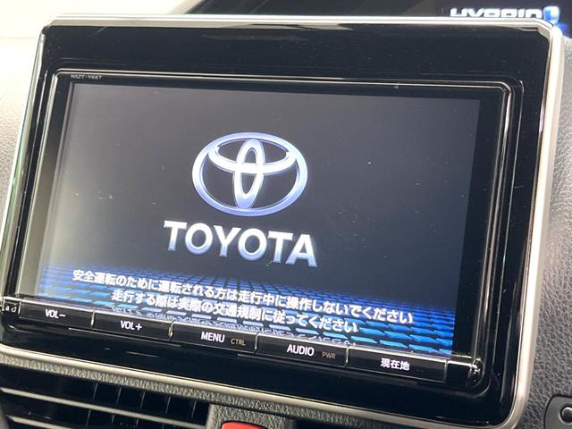 エスクァイア ハイブリッドGi 禁煙車 純正9インチナビ バックカメラ 両側パワースライドドア セーフティセンスC 合皮シート シートヒーター スマートキー LEDヘッド ETC クルコン オートマチックハイビーム オートエアコン(4枚目)