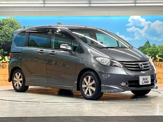 フリード Ｇ　エアロ　ジャストセレクション　両側電動ドア　純正ナビ　バックカメラ　ＥＴＣ　ＨＩＤヘッドランプ　７人乗り　ＣＤ再生　盗難防止装置　プライバシーガラス　オートライト（34枚目）