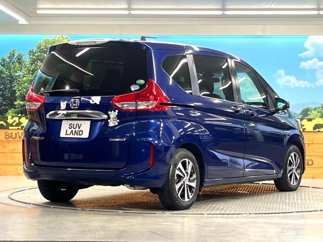 フリードハイブリッド ハイブリッド・ＥＸ　両側電動スライドドア　フリップダウンモニター　バックカメラ　ホンダセンシング　レーダークルーズコントロール　禁煙車　ハーフレザーシート　ドライブレコーダー　コーナーセンサー　前席シートヒーター　ＥＴＣ（18枚目）