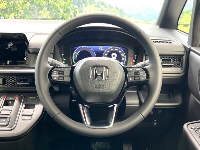 ステップワゴン ｅ：ＨＥＶスパーダ　登録済未使用車　両側電動スライドドア　ホンダセンシング　レーダークルーズ　電動リアゲート　ハーフレザーシート　コーナーセンサー　前席シートヒーター　スマートキー　ＬＥＤヘッド　純正１６インチアルミ（12枚目）