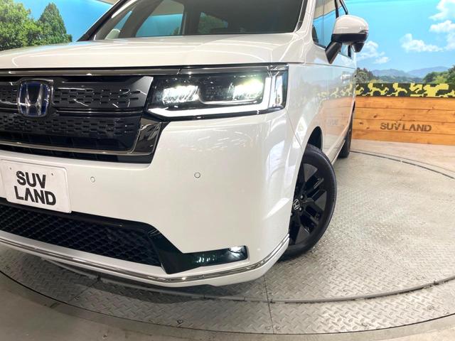 ステップワゴン ｅ：ＨＥＶスパーダ　登録済未使用車　両側電動スライドドア　ホンダセンシング　レーダークルーズ　電動リアゲート　ハーフレザーシート　コーナーセンサー　前席シートヒーター　スマートキー　ＬＥＤヘッド　純正１６インチアルミ（13枚目）