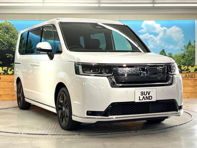 ステップワゴン ｅ：ＨＥＶスパーダ　登録済未使用車　両側電動スライドドア　ホンダセンシング　レーダークルーズ　電動リアゲート　ハーフレザーシート　コーナーセンサー　前席シートヒーター　スマートキー　ＬＥＤヘッド　純正１６インチアルミ（17枚目）