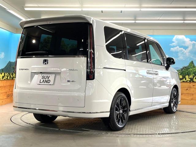 ステップワゴン ｅ：ＨＥＶスパーダ　登録済未使用車　両側電動スライドドア　ホンダセンシング　レーダークルーズ　電動リアゲート　ハーフレザーシート　コーナーセンサー　前席シートヒーター　スマートキー　ＬＥＤヘッド　純正１６インチアルミ（18枚目）