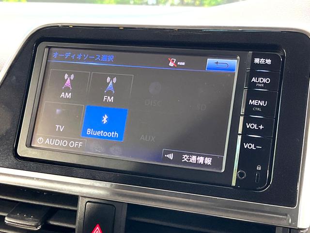 シエンタ ハイブリッドＧ　両側パワースライドドア　プリクラッシュセーフティシステム　純正ＳＤナビ　ＥＴＣ　Ｂｌｕｅｔｏｏｔｈ　７人乗り　オートマチックハイビーム　先行車発進お知らせ機能　革巻きステアリング　ステアリングスイッチ（24枚目）