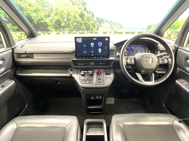 ステップワゴン ｅ：ＨＥＶスパーダ　両側電動スライドドア　ブラインドスポットインフォメーション　ホンダセンシング　パワーバックドア　ＥＴＣ　革巻きステアリング　ＬＥＤヘッドライト　純正１６インチアルミホイール　左右独立フルオートエアコン（2枚目）