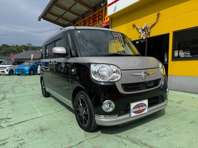 ムーヴキャンバス Ｘリミテッドメイクアップ　ＳＡＩＩ　社外ナビ　フルセグ　バックカメラ　両側パワスラ　ＬＥＤヘッドライト　フォグランプ　シートカバー　社外１４インチアルミ　革巻きステアリング　ステアリングスイッチ　キーフリー　エコアイドル　ＥＴＣ（8枚目）