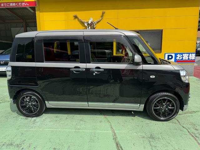 ムーヴキャンバス Ｘリミテッドメイクアップ　ＳＡＩＩ　社外ナビ　フルセグ　バックカメラ　両側パワスラ　ＬＥＤヘッドライト　フォグランプ　シートカバー　社外１４インチアルミ　革巻きステアリング　ステアリングスイッチ　キーフリー　エコアイドル　ＥＴＣ（9枚目）