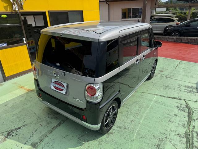 ムーヴキャンバス Ｘリミテッドメイクアップ　ＳＡＩＩ　社外ナビ　フルセグ　バックカメラ　両側パワスラ　ＬＥＤヘッドライト　フォグランプ　シートカバー　社外１４インチアルミ　革巻きステアリング　ステアリングスイッチ　キーフリー　エコアイドル　ＥＴＣ（12枚目）