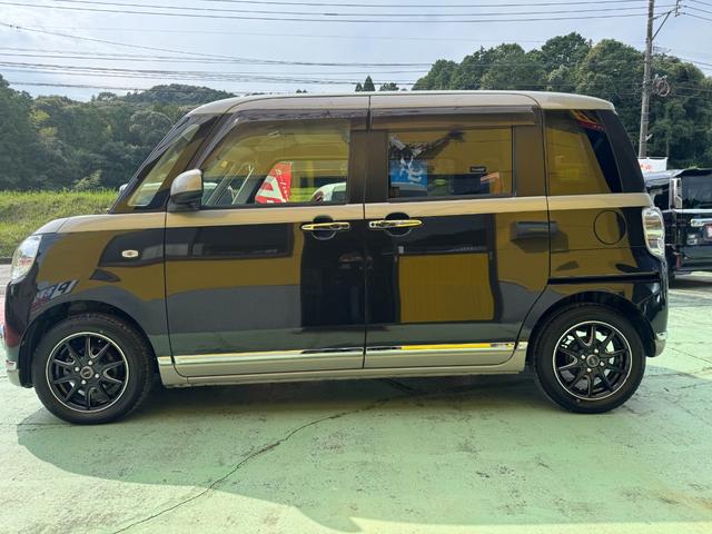 ムーヴキャンバス Ｘリミテッドメイクアップ　ＳＡＩＩ　社外ナビ　フルセグ　バックカメラ　両側パワスラ　ＬＥＤヘッドライト　フォグランプ　シートカバー　社外１４インチアルミ　革巻きステアリング　ステアリングスイッチ　キーフリー　エコアイドル　ＥＴＣ（14枚目）