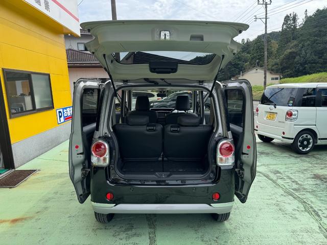 ムーヴキャンバス Ｘリミテッドメイクアップ　ＳＡＩＩ　社外ナビ　フルセグ　バックカメラ　両側パワスラ　ＬＥＤヘッドライト　フォグランプ　シートカバー　社外１４インチアルミ　革巻きステアリング　ステアリングスイッチ　キーフリー　エコアイドル　ＥＴＣ（77枚目）