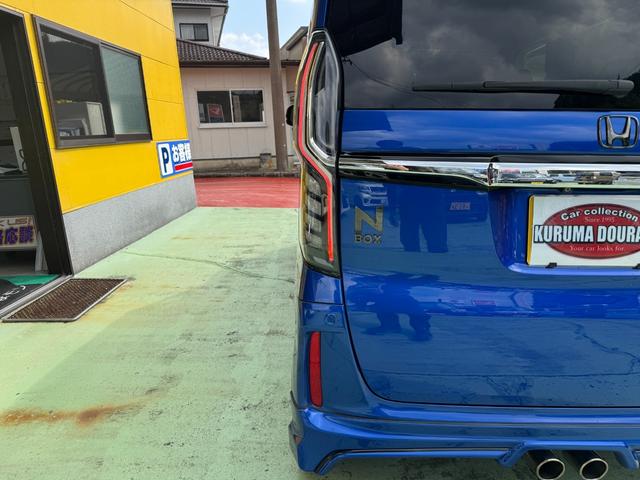 N-BOXカスタム G・EXターボホンダセンシング 無限フルエアロ マフラー バイザー 純正8インチナビ バックカメラ 純正15インチアルミ 両側パワスラ シートカバー ステアリングスイッチ クルコン LEDヘッドライト フォグランプ スマートキー(33枚目)