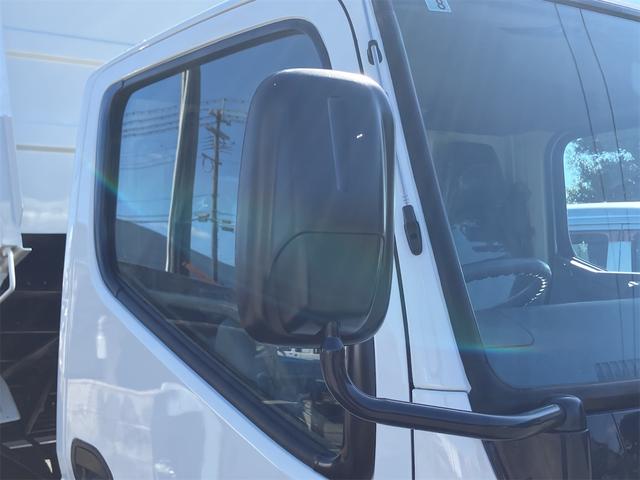 キャンター ダンプ　２．０ｔ　５速ＭＴ　後輪ダブル　エアコン　パワーステアリング　パワーウィンドウ　運転席エアバッグ（7枚目）