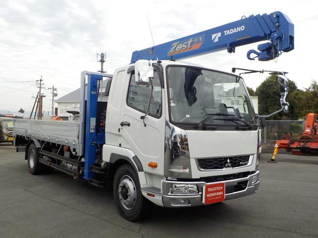 ファイター 　標準幅　増トンセルフクレーン　４段ラジコン　タダノ製ハイジャッキ　７．２トン積み　未使用　ターボ　衝突軽減ブレーキ　横滑り防止装置　ＥＴＣ　キーレス　フロントフォグランプ　三方開　後輪ダブル　ベッド付（3枚目）