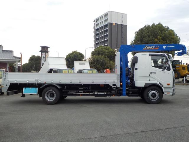 ファイター 　標準幅　増トンセルフクレーン　４段ラジコン　タダノ製ハイジャッキ　７．２トン積み　未使用　ターボ　衝突軽減ブレーキ　横滑り防止装置　ＥＴＣ　キーレス　フロントフォグランプ　三方開　後輪ダブル　ベッド付（4枚目）